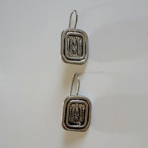 Silver earrings with etched design